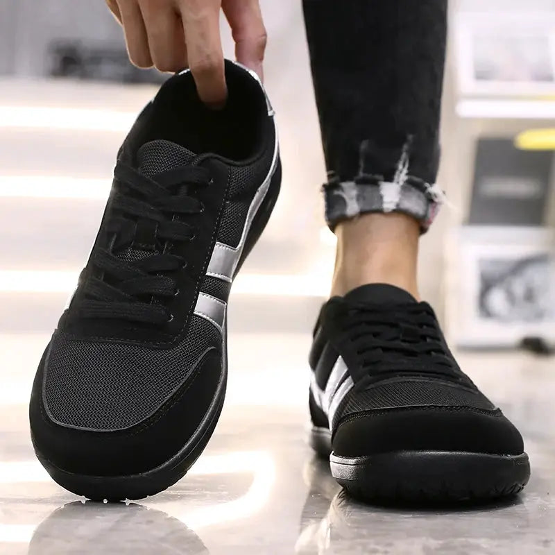 Pair of wide running shoes by Simples Market, black anti-slip breathable mesh uppers