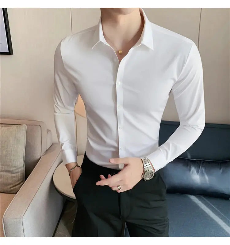 Men's white long-sleeve dress shirt, slim fit, ideal for formal or smart-casual wear.
