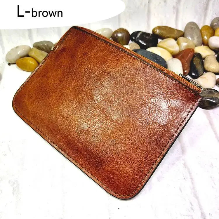 Brown leather mini zipper waist bag by Simples Market; compact belt-pack wallet for IDs and cards