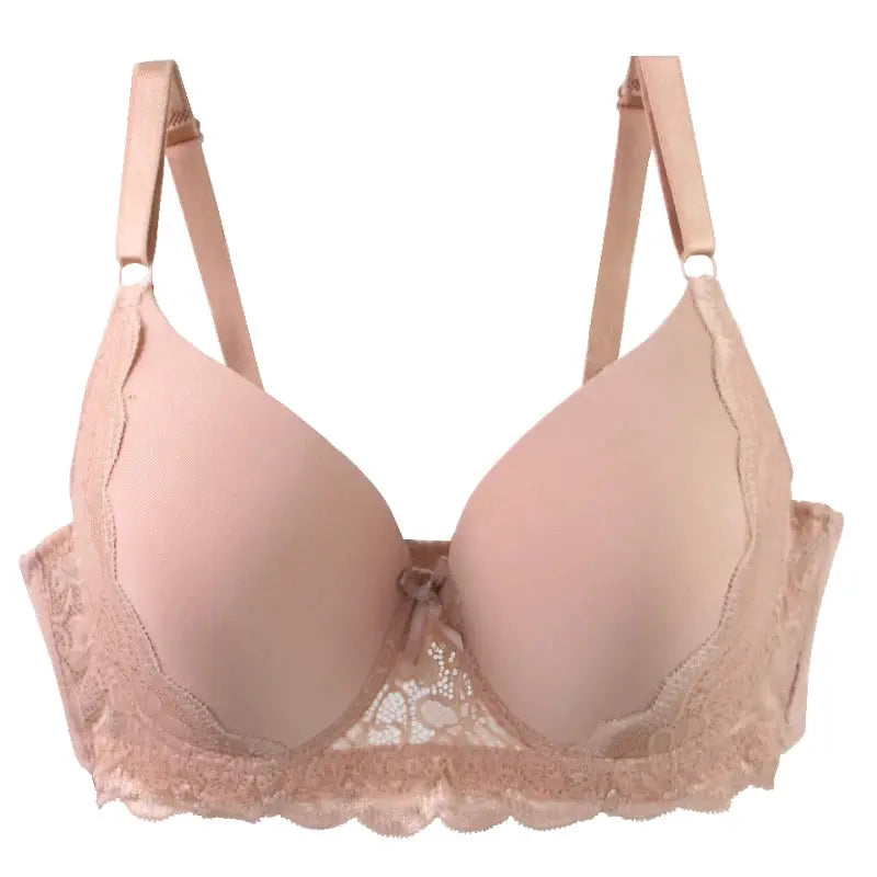 Push-up bra by Simples Market in pink nude lace with scalloped edges and adjustable straps.