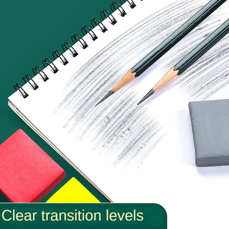 Pencils and erasers on a spiral notebook with a grey eraser block on a green background