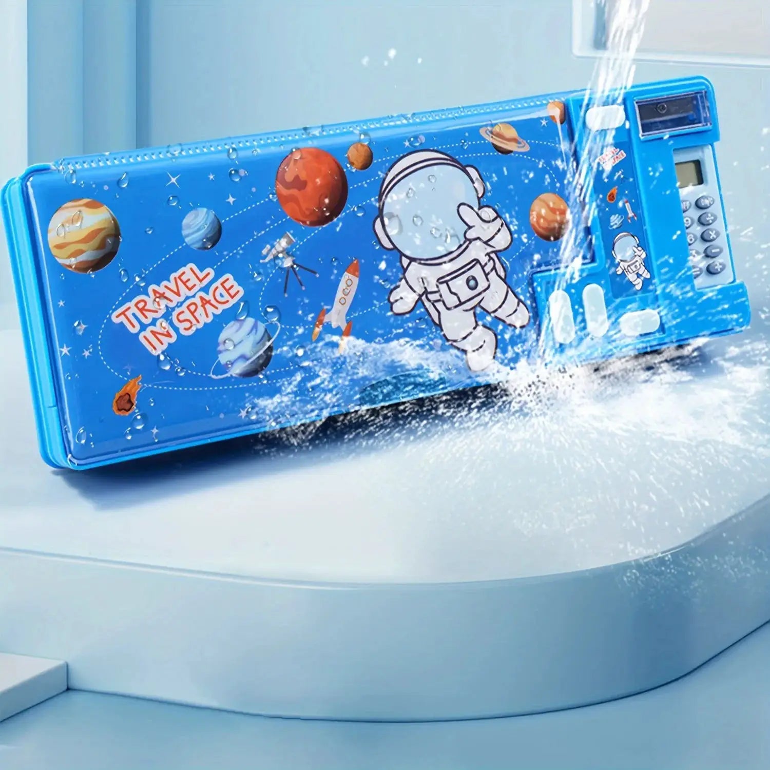 Kids' pencil case with built-in calculator, blue space-themed exterior by Simples Market