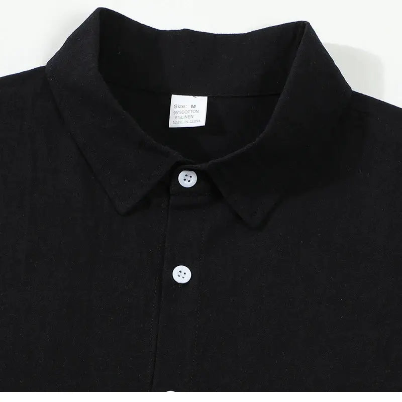 Men's black cotton-linen button-up shirt by Simples Market with white buttons and turn-down collar.