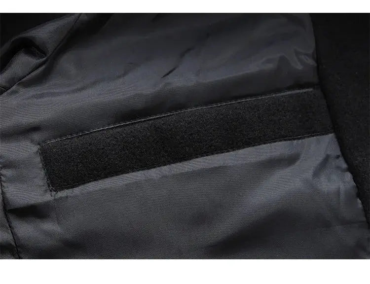 Men's wool overcoat by Simples Market; interior pocket with Velcro closure in black