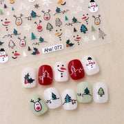 Winter Christmas nail stickers set by Simples Market featuring snowmen and trees; self-adhesive deco in white and red.