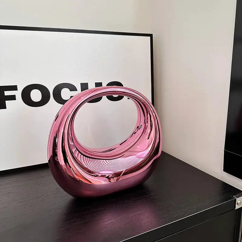 MOODS pink metallic PVC handbag with round handle clutch for evening events
