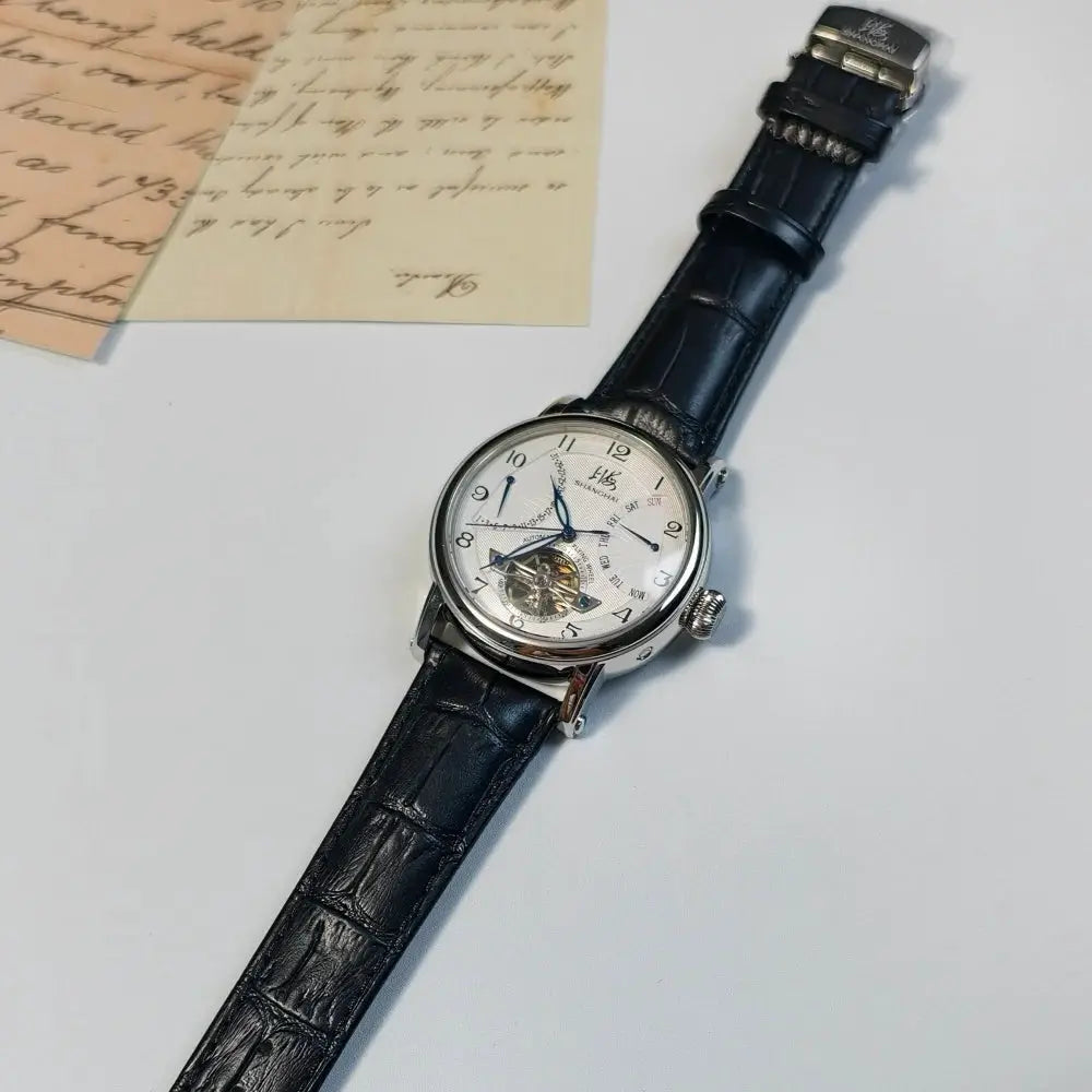 Shanghai Watch 42mm automatic timepiece with open-heart dial, stainless steel case, black leather strap