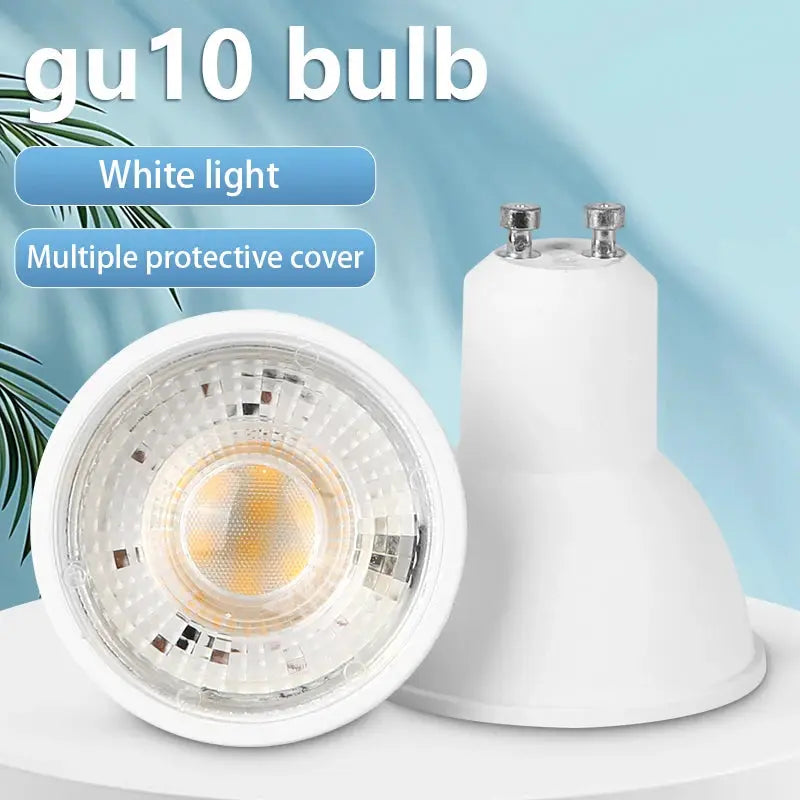 GU10 LED spotlight bulb with white housing and reflective lens.