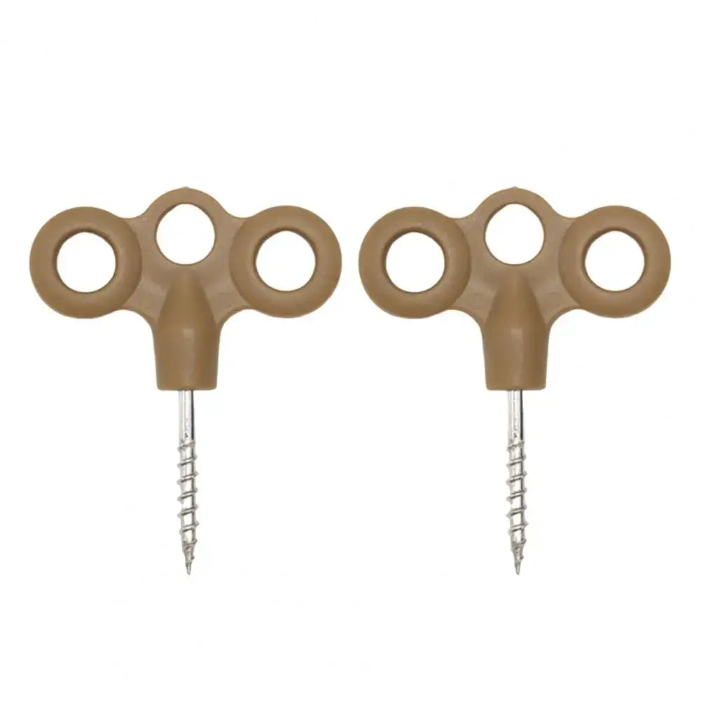 2pcs Simples Market ground anchors with tan triple-loop T-handle and stainless steel screw-in spikes