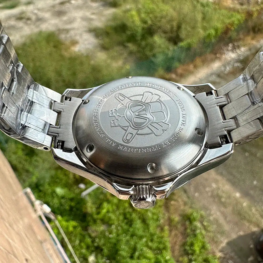 STEELDIVE SD1957 dive watch; stainless steel case back with engravings and crown detail