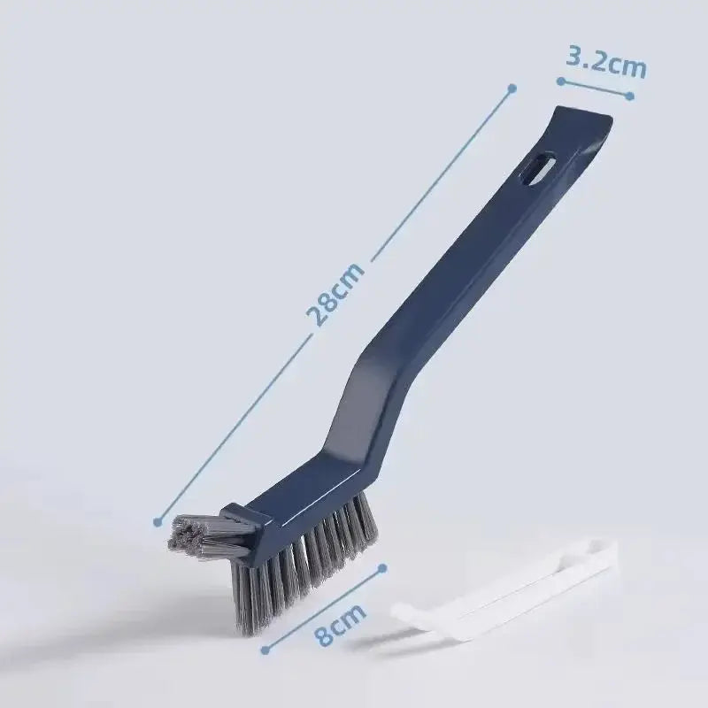 2-in-1 cleaning brush for corners and gaps with blue angled handle and bristle head Simples Market includes spare strip.
