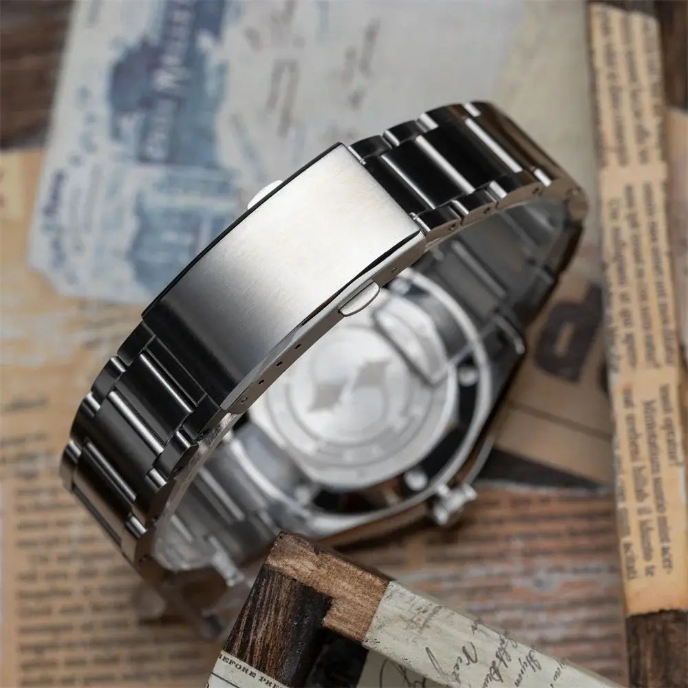 Proxima PX1697 men's 39mm stainless steel watch with black bracelet and transparent caseback.