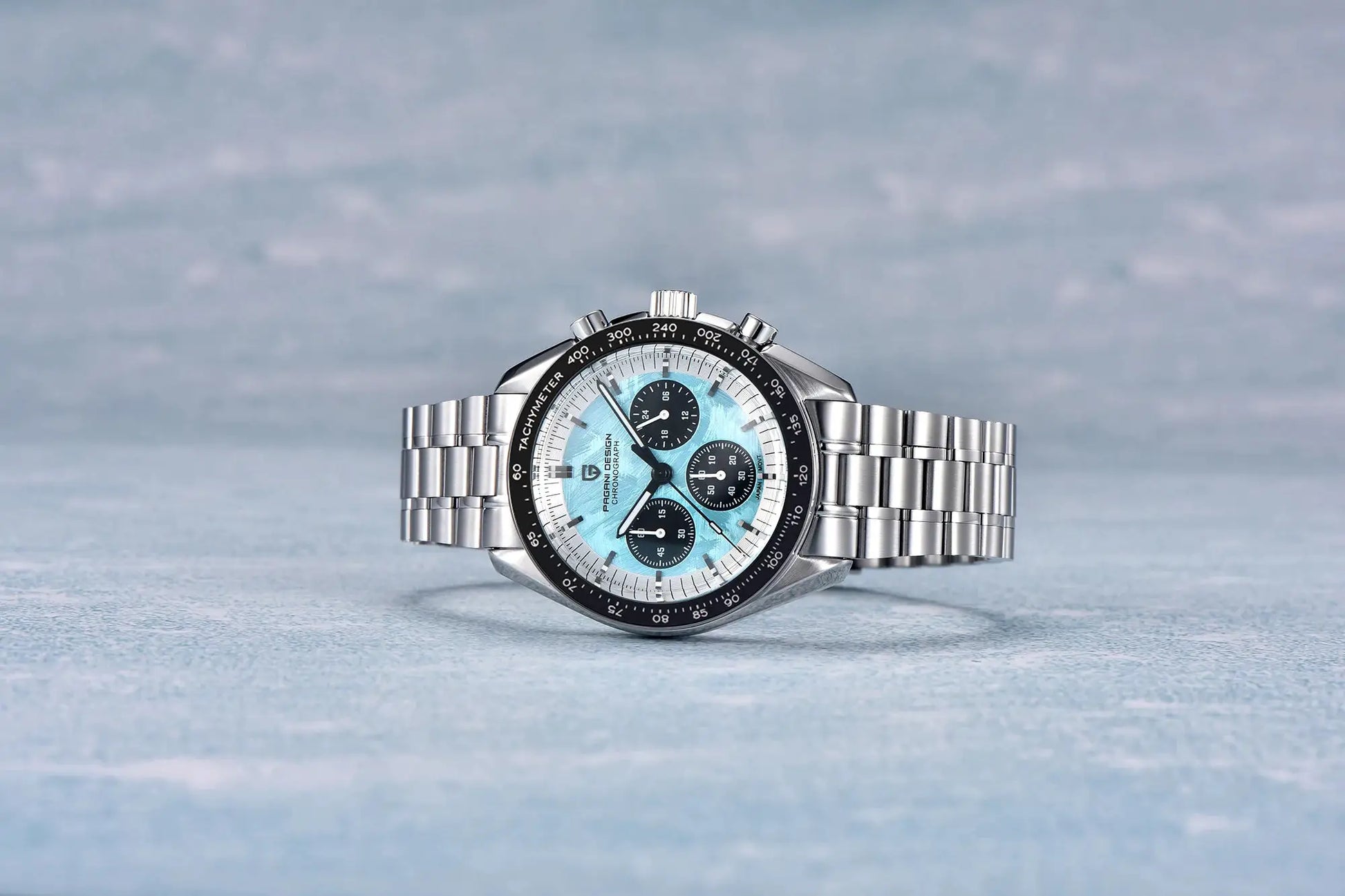 Pagani Design Moon Chronograph watch with stainless steel bracelet, light blue dial, and black tachymeter bezel