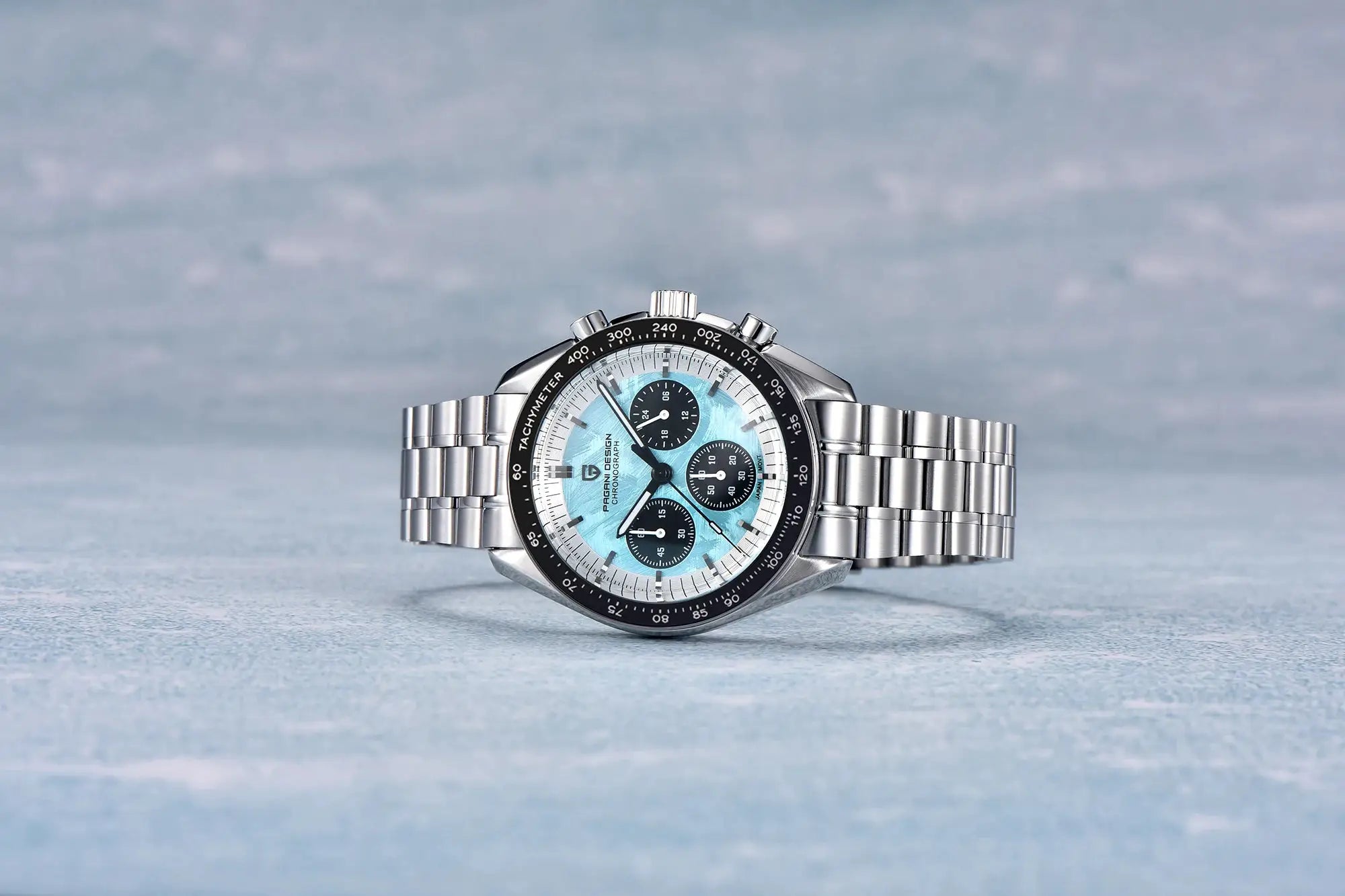 Pagani Design Moon Chronograph watch with stainless steel bracelet, light blue dial, and black tachymeter bezel