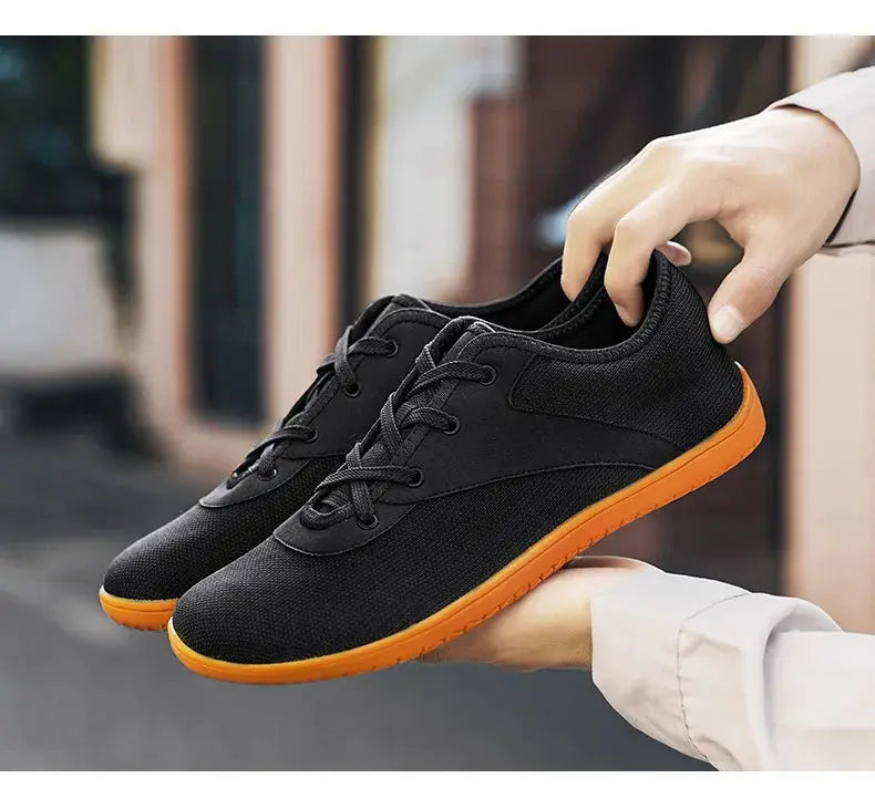 Simples Market men's trail running shoes, black minimalist sneakers with orange outsole, wide width