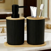 2-piece black bathroom accessories set with bamboo lids: soap dispenser and toothbrush cup, Simples Market.
