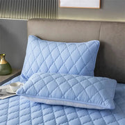Simples Market blue quilted pillowcase pair, solid color, waterproof and breathable.