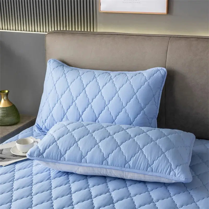 Simples Market blue quilted pillowcase pair, solid color, waterproof and breathable.