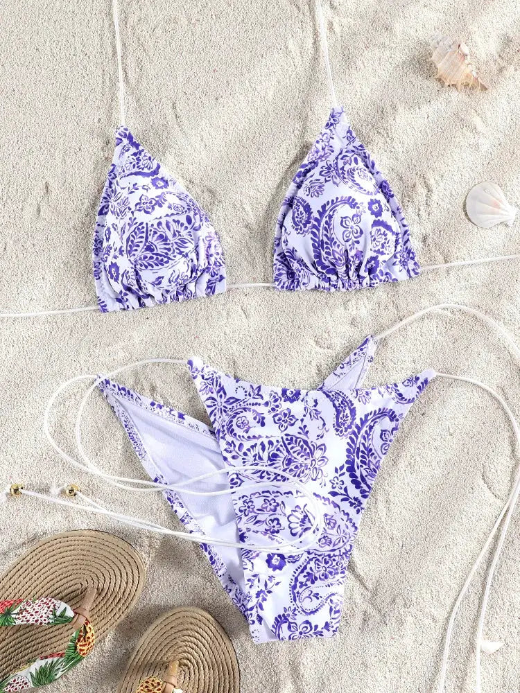 ZRTAK bikini set with purple floral print on white, string-tie top and high-cut bottoms