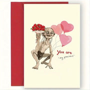 Valentine's Day greeting card with envelope; goblin-like figure holding red roses and pink heart balloons.