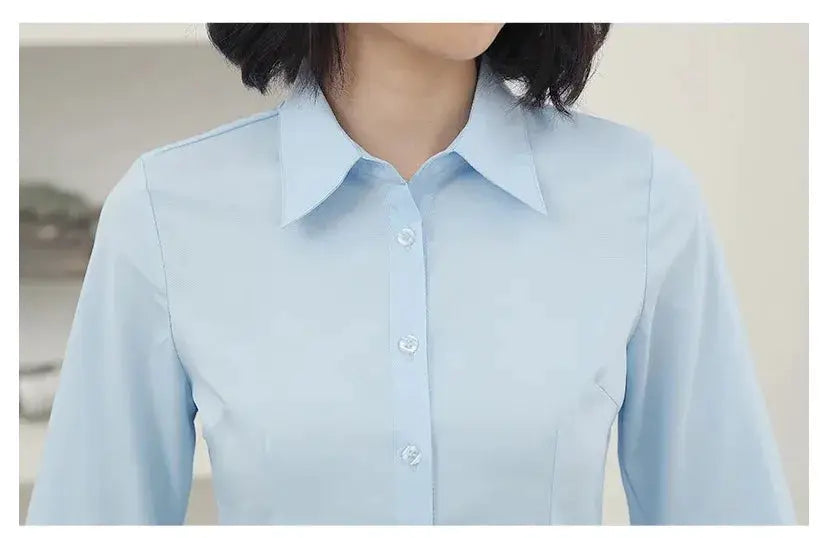 Women’s light-blue long-sleeve button-down blouse by Simples Market