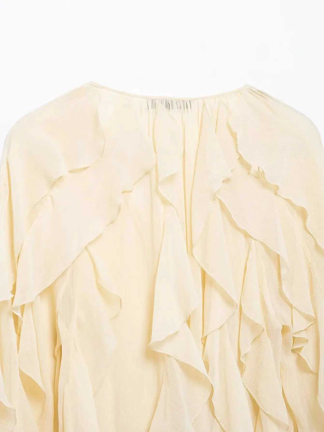Women's cream yellow ruffled blouse with cascading layers and gathered neckline
