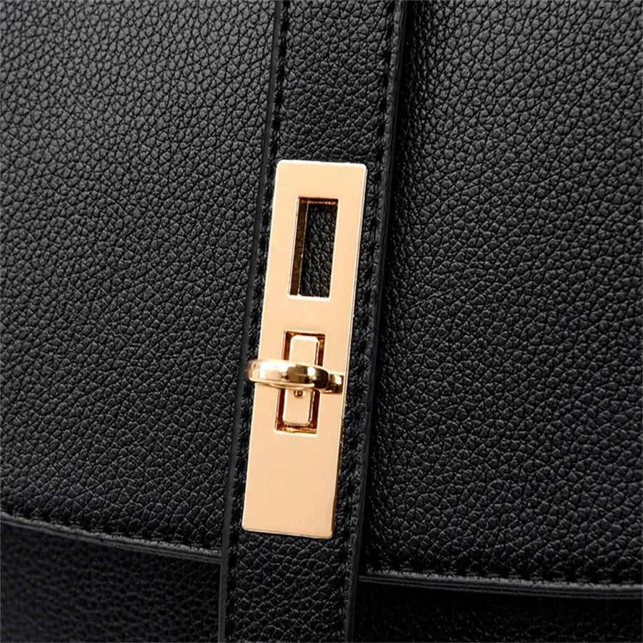Leather backpack, black pebbled leather with gold-tone hardware
