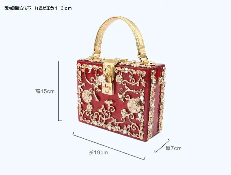 Evening box handbag by Simples Market, red with gold floral metal filigree and crystals, top gold handle, 19x15x7 cm.