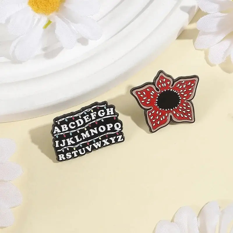 Sci Fi Horror Enamel Pins Cannibal Flowers and 26 English Letter Brooches for Backpacks Lapels and Gifts