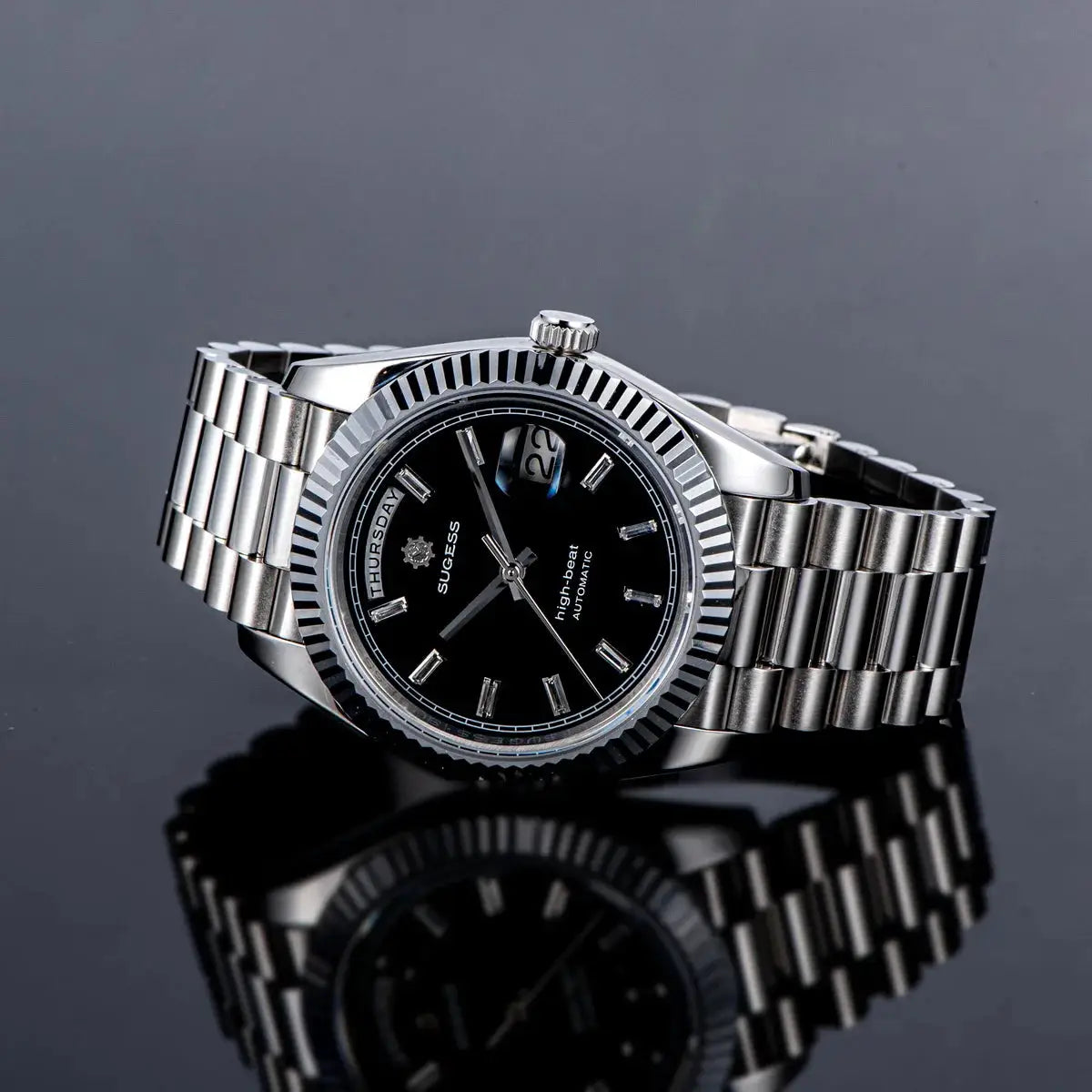 Sugess men's 40mm automatic wristwatch with black dial, stainless steel bracelet and day-date display.