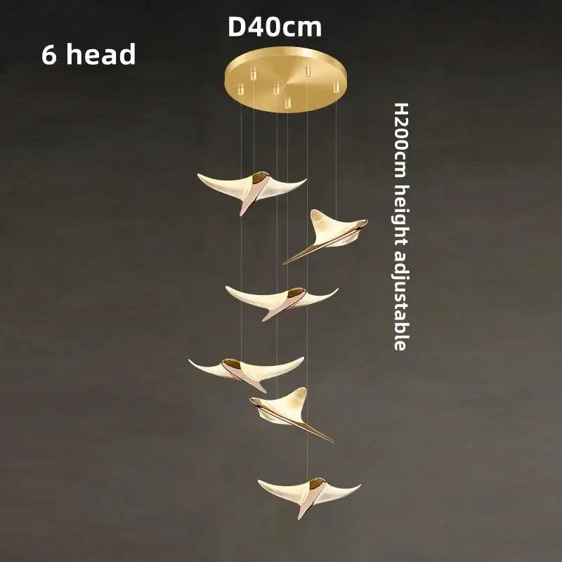 Seagull staircase pendant lamp with six bird pendants hanging from a gold ceiling canopy; height adjustable, 40 cm diameter.