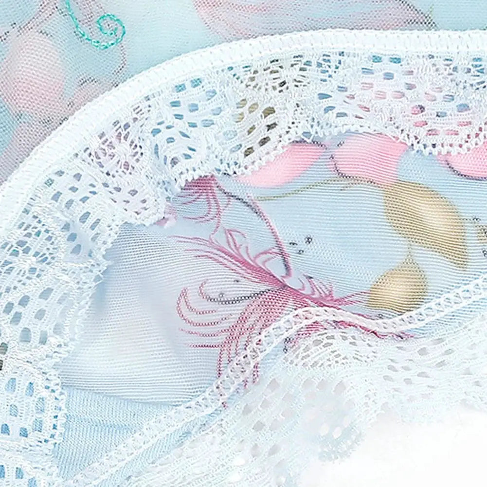 White lace briefs, nylon fabric, close-up view of delicate lace trim.