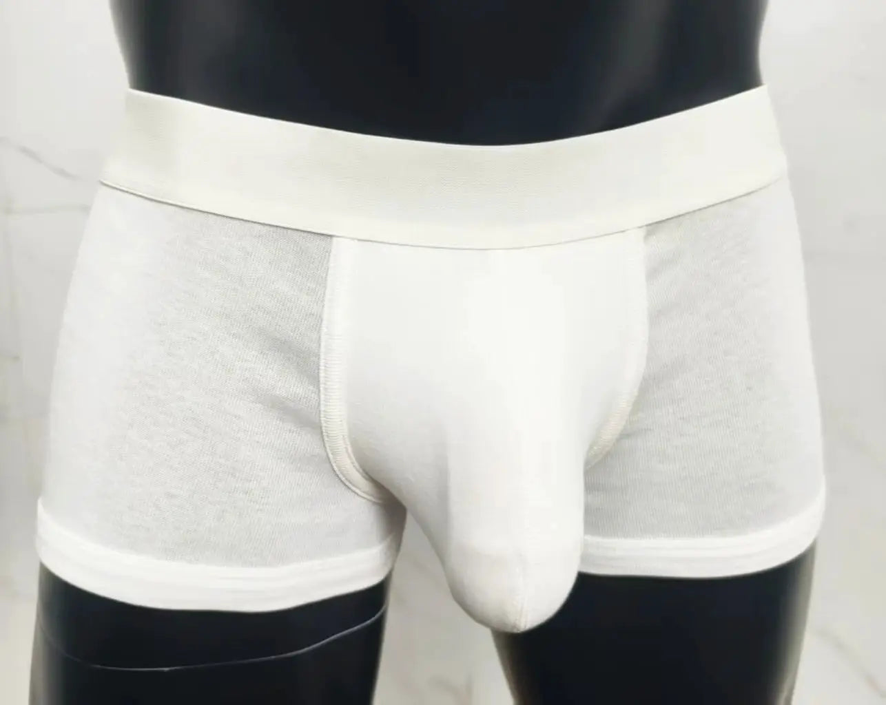 White cotton men's boxer briefs with front pouch and wide elastic waistband