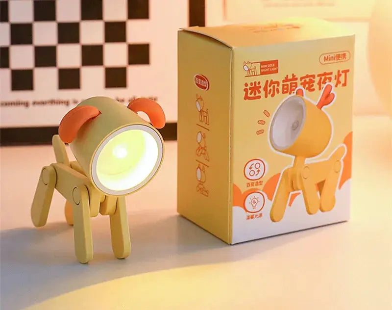 Mini LED night light folding desk lamp in pastel green with orange ears; 2 items, lamp and box, cartoon animal shape, Simples Market.