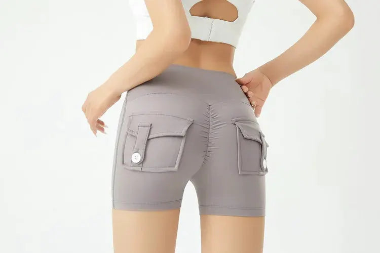 Peach Butt Fitness Shorts in grey with back cargo pockets and a tight fit.