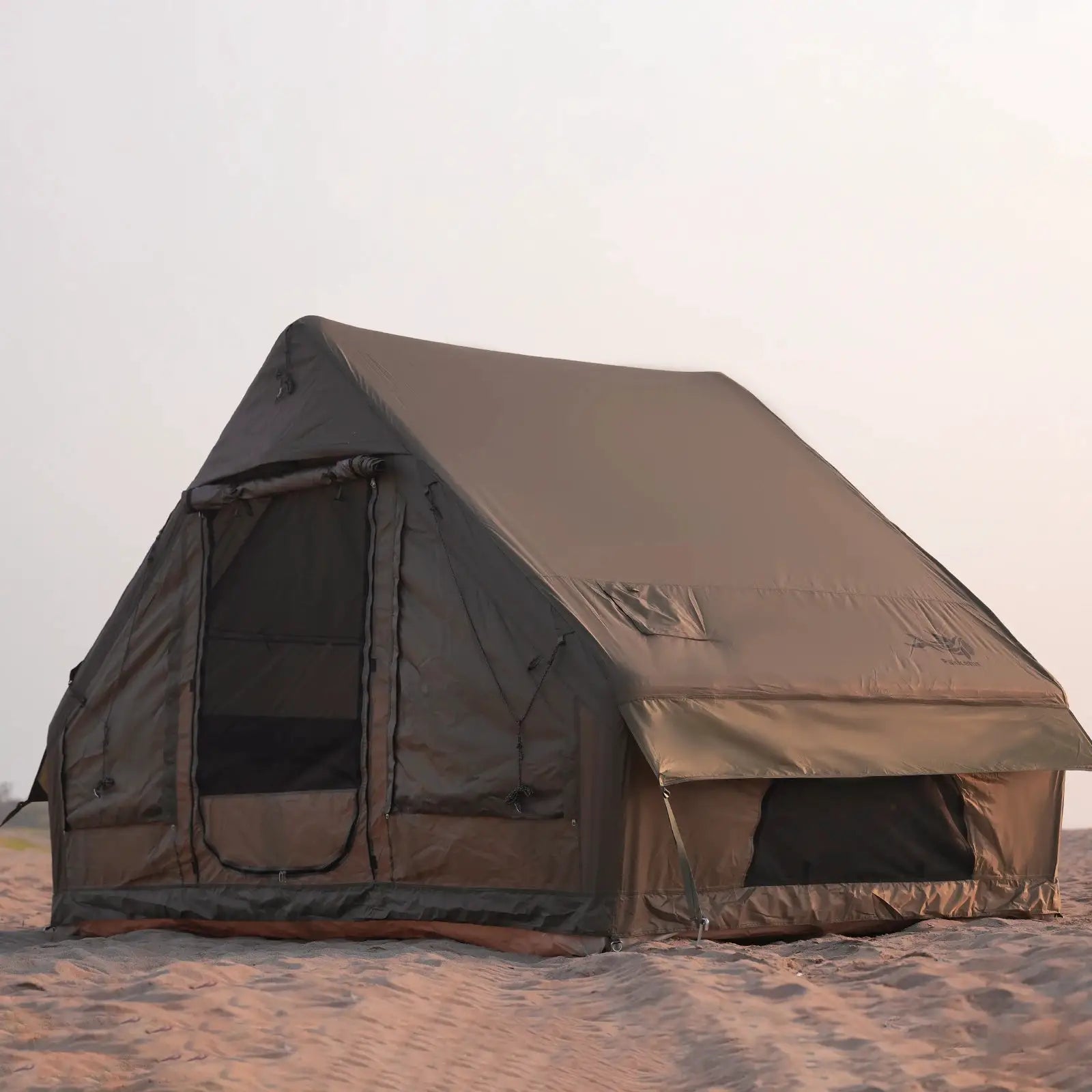 Simples Market inflatable camping tent in brown/tan, large multi-room family tent on sand.
