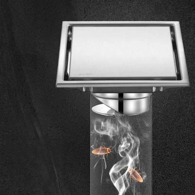 Square stainless steel bathroom floor drain by Simples Market with hidden base and anti-odor design