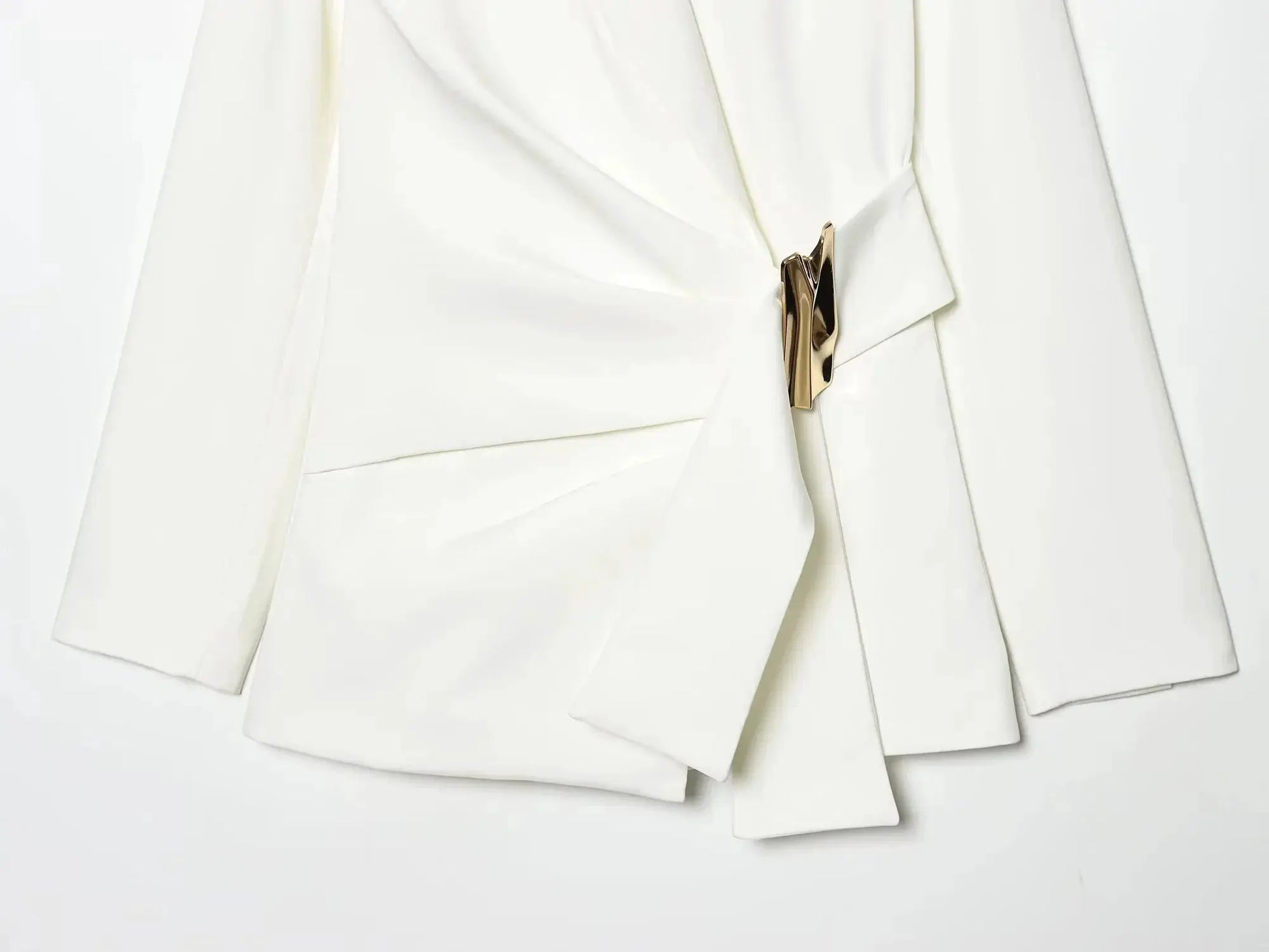 White women's blazer with gold-tone clasp hardware, tailored long-sleeve jacket.