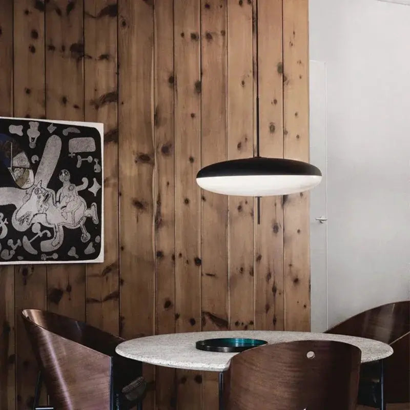 Nordic LED pendant light with flying saucer design, black top and white diffuser for indoor decorative use