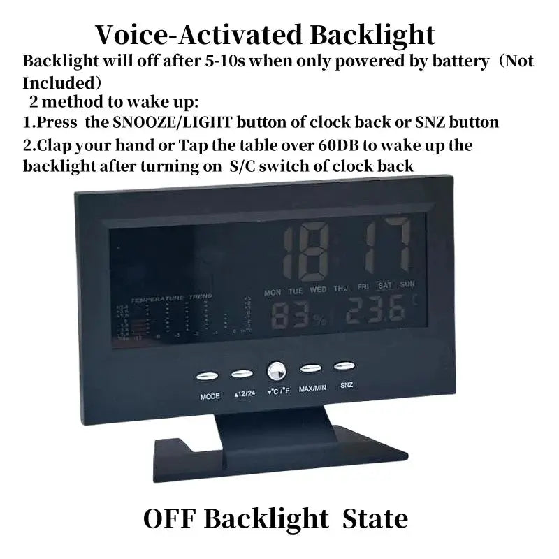Black digital LCD weather station clock with thermometer, hygrometer and calendar display.