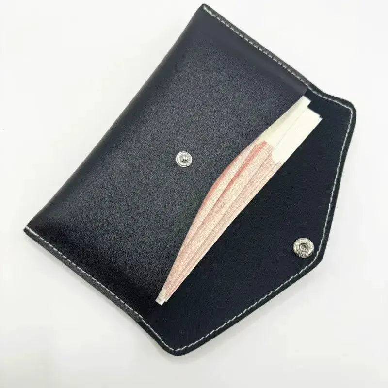 Simples Market unisex retro long wallet in black leather with white stitching, cash slots visible.