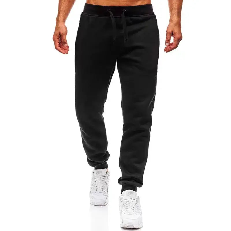 Men's black jogger pants with drawstring waist for running and gym workouts