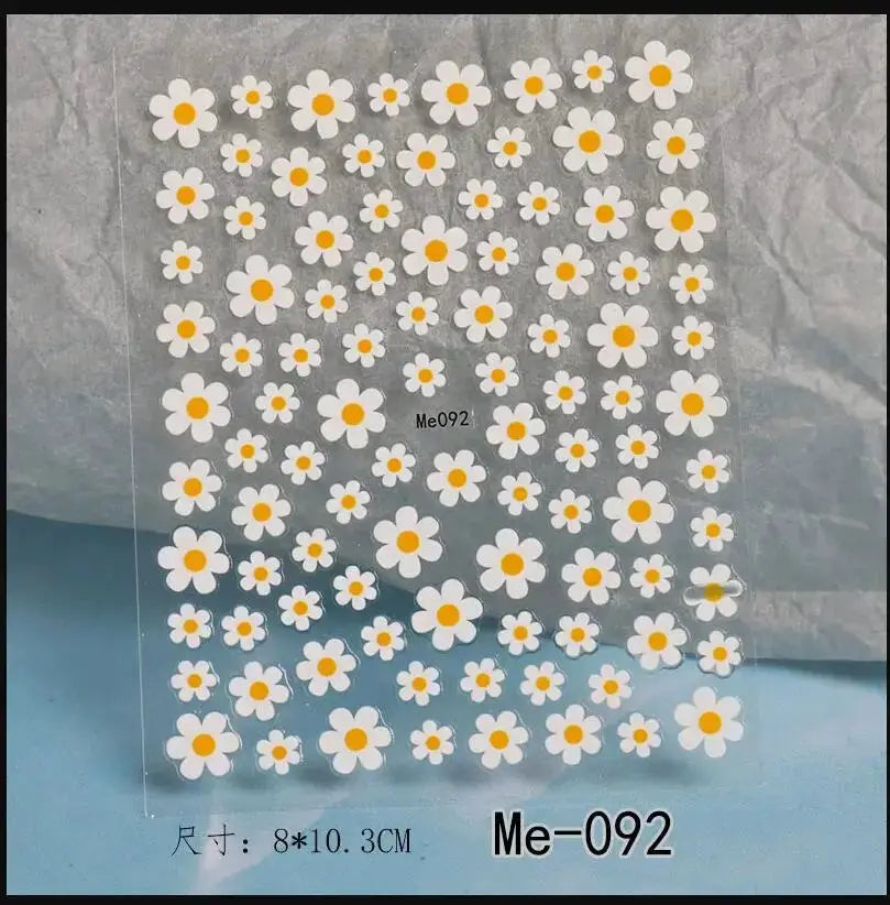 Sheet of white daisy nail decals with yellow centers for manicure, Me-092