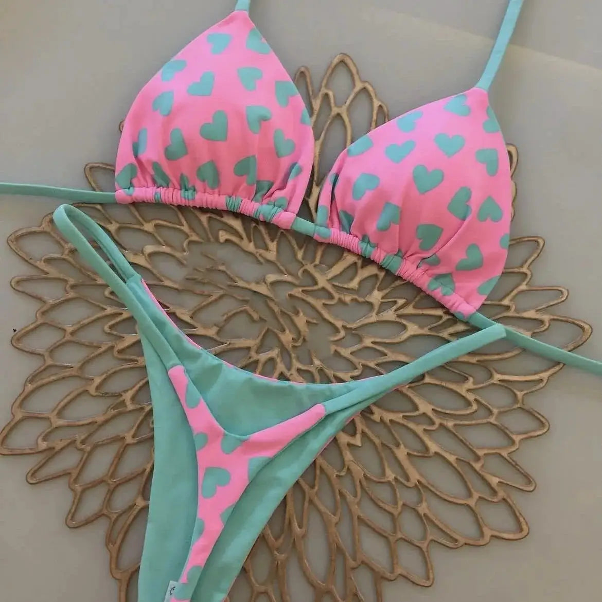 Simples Market women's bikini set with pink heart-print triangle top and teal G-string bottom