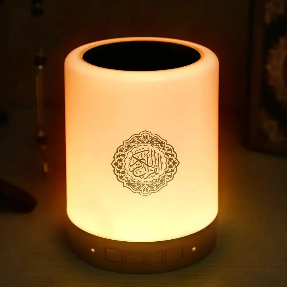 Portable multifunctional sound machine LED night light by Simples Market; warm amber glow, Bluetooth speaker.