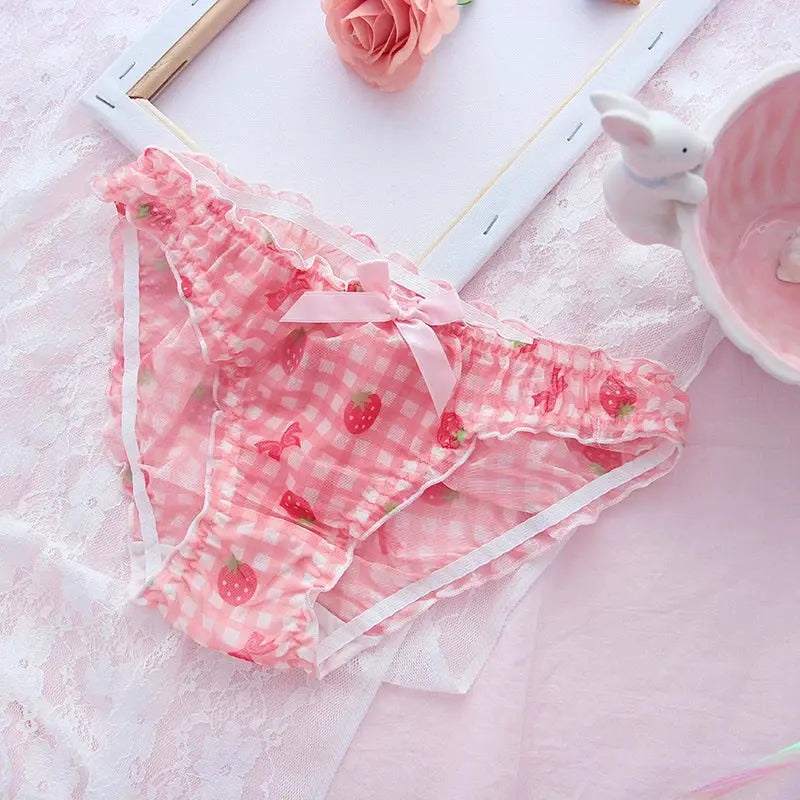 Pink strawberry-print panties with bow and ruffle trim, breathable mesh lingerie