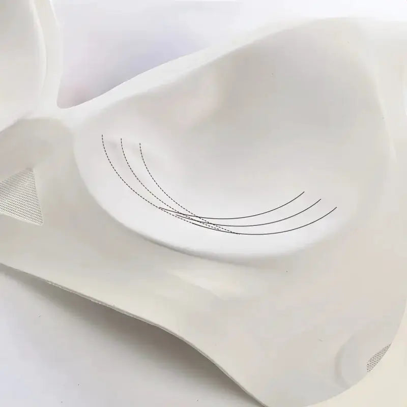 White seamless bralette with mesh panels, wireless design and molded cups