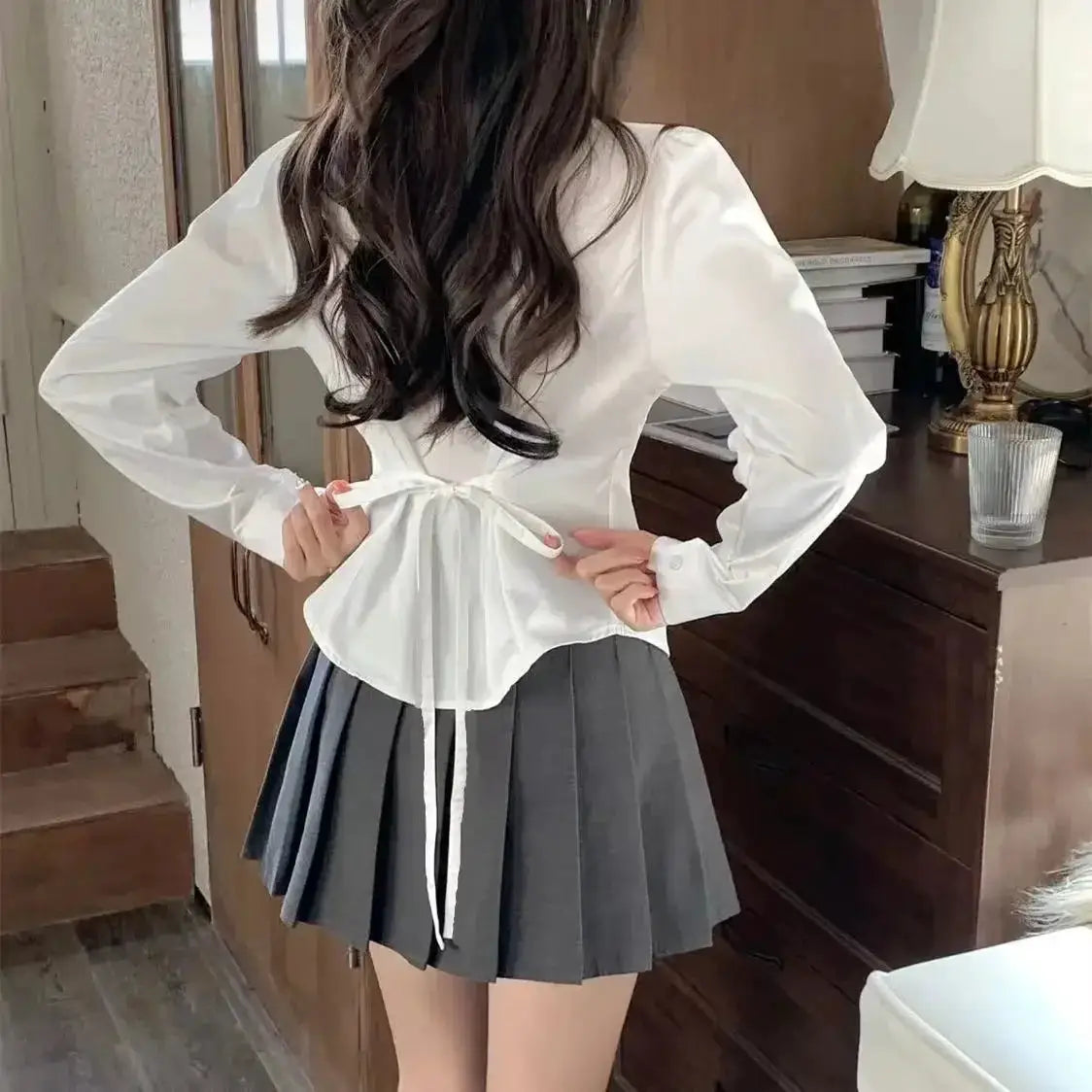 Simples Market white long-sleeve blouse with back waist tie and gray pleated skirt (2-piece outfit)