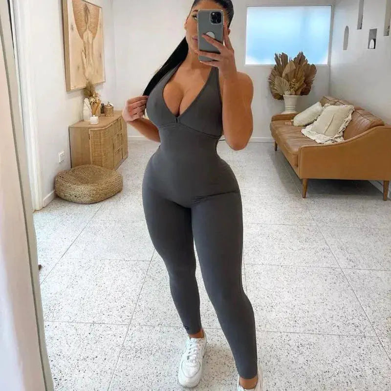 Yoga jumpsuit for women in gray with padding, sporty fitness overalls