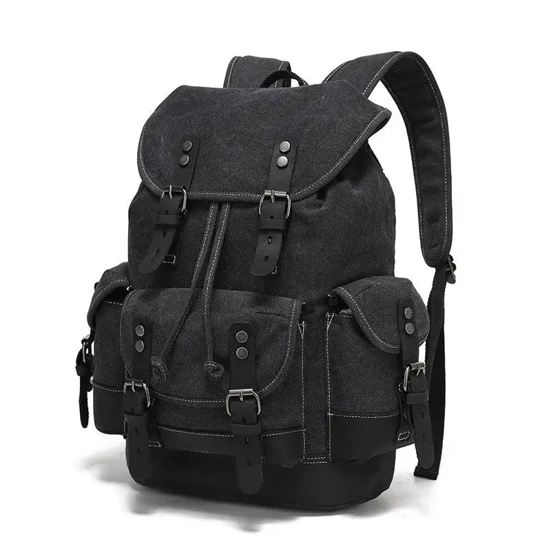 Simples Market vintage canvas backpack for men, black with buckled straps and multiple pockets.